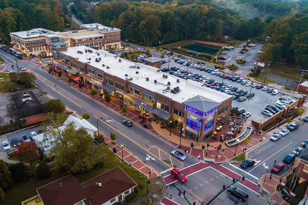 Aerial view of a town-center shopping street in Holly Springs, NC